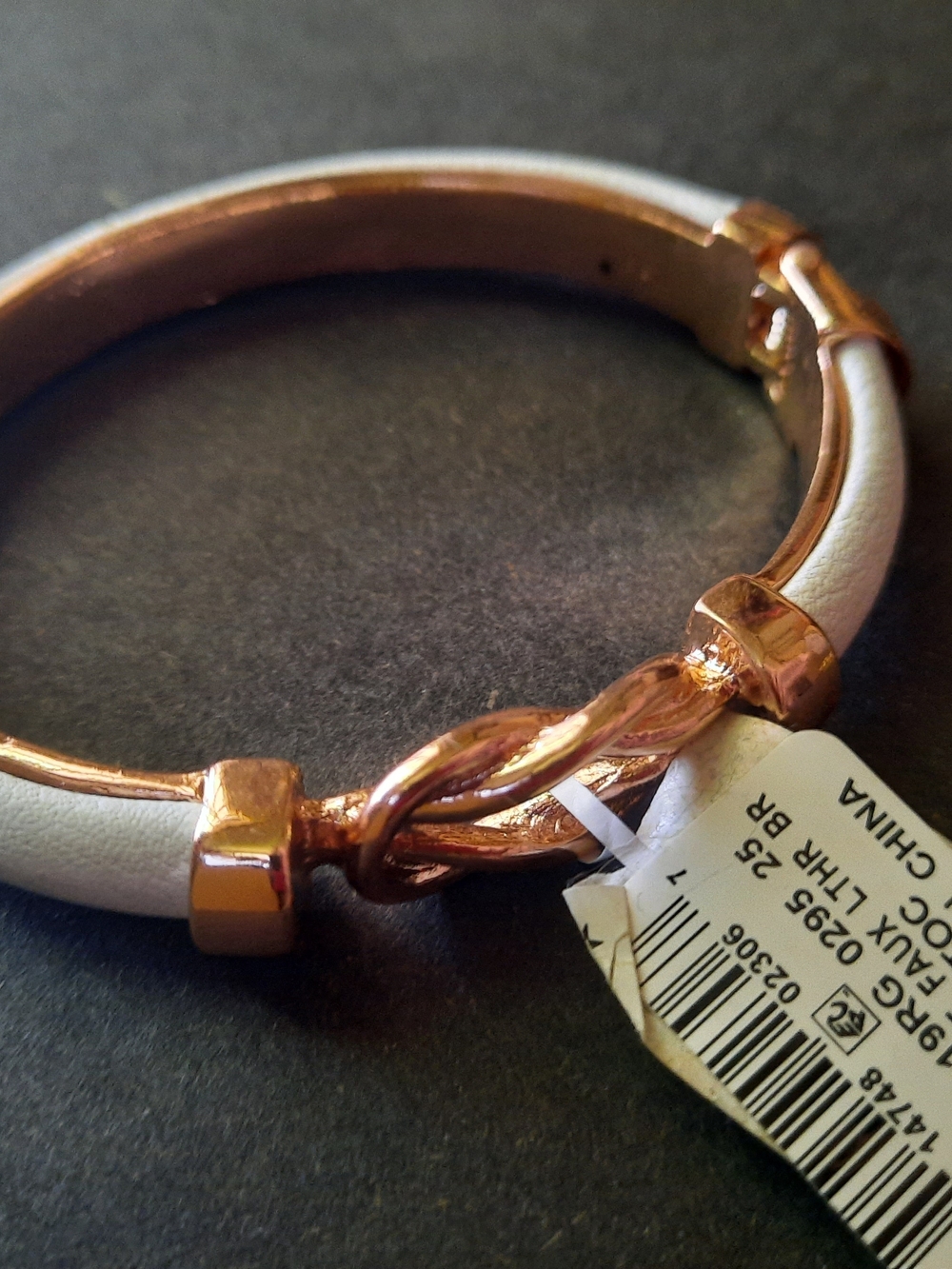 NWT*flaws*Rose Gold and White Leather Twist Bracelet